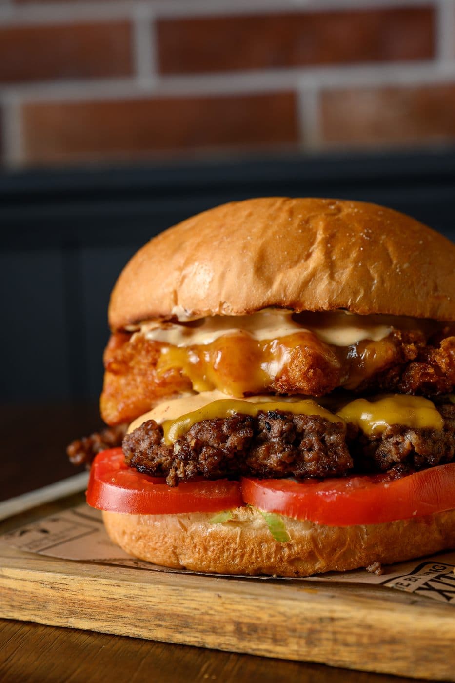 Mac Attack burger with melted cheese and tomato