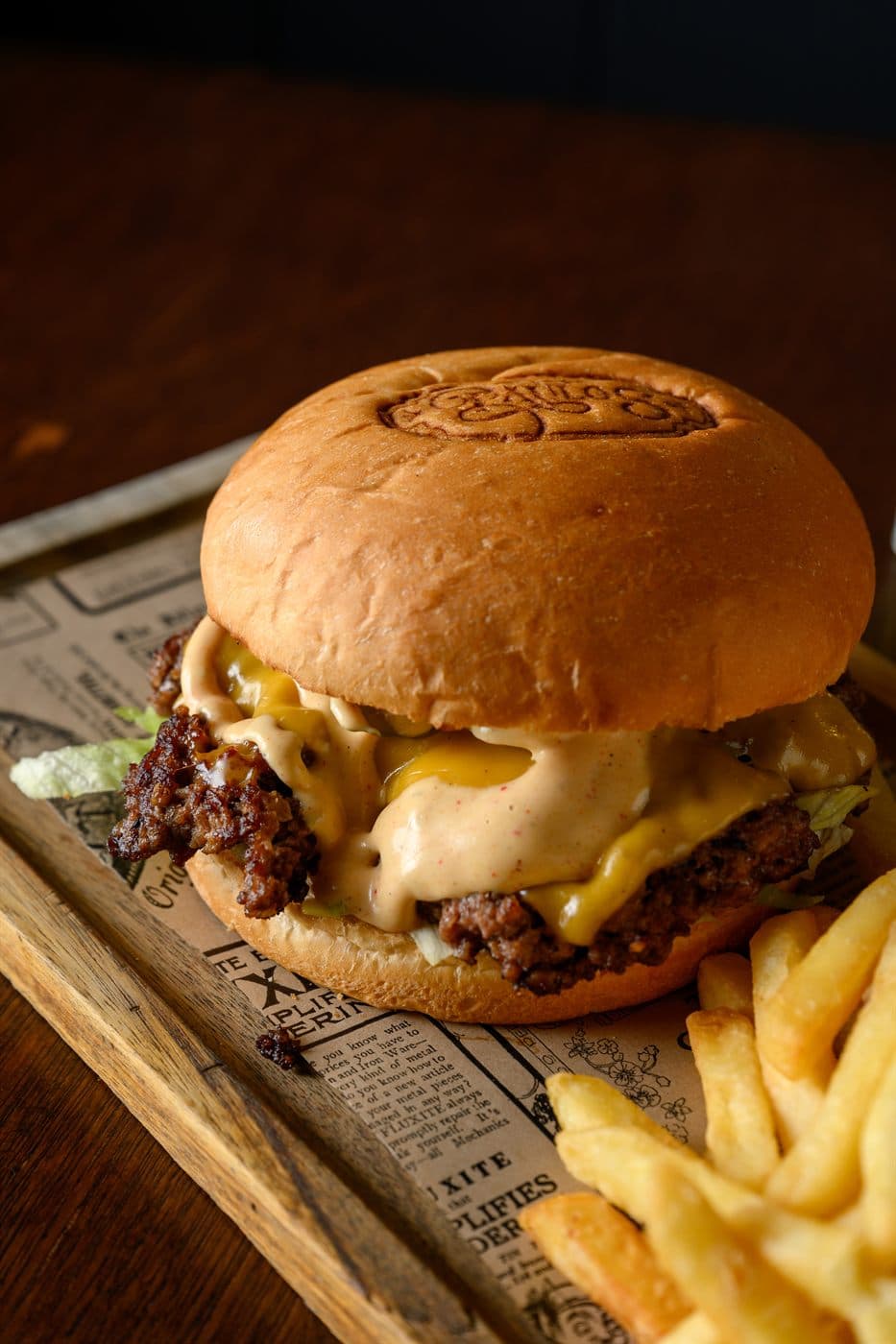 New Haven burger on a wooden board