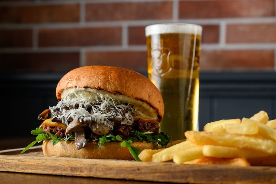 Burger and fries with a cold beer